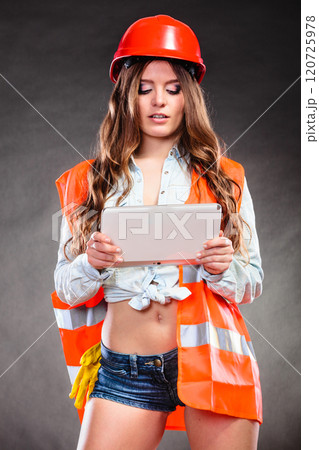 Woman structural engineer with tablet working. Woman structural engineer with tablet working. 120725978