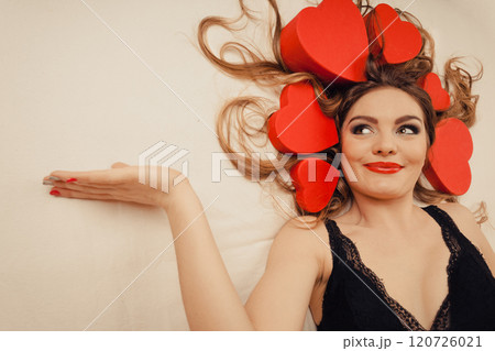 Woman in lingerie in bed. Valentines day love. Woman in lingerie in bed. Valentines day love. 120726021