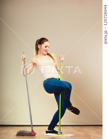 Funny cleaning woman mopping floor dancing Funny cleaning woman mopping floor dancing 120726044