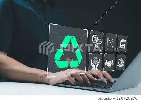 Recycle icon, Sustainable Development Concept. Person using a laptop with recycling icon, surrounded by various sustainability symbol, concepts of eco-friendly practices and sustainable development Recycle icon, Sustainable Development Concept. Person using a laptop with recycling icon, surrounded by various sustainability symbol, concepts of eco-friendly practices and sustainable development 120726270