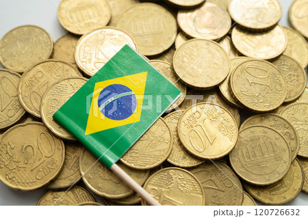 Brazil flag on coin and banknote money, finance trading investment business currency concept. 120726632