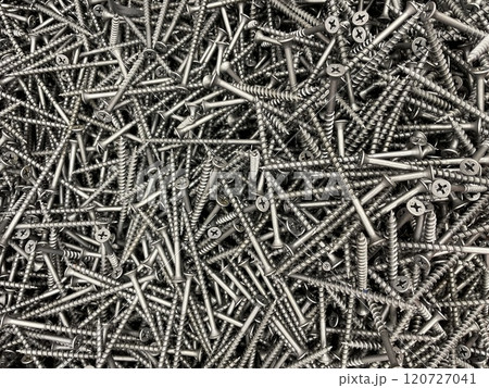 Black steel self-tapping screws used in handicrafts background texture Black steel self-tapping screws used in handicrafts background texture 120727041