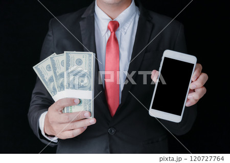 Businessman holding cash and smartphone. Businessman holding cash and smartphone. 120727764