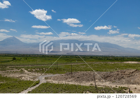 Stunning view of Mount Ararat under a clear blue sky with lush landscapes in Armenia Stunning view of Mount Ararat under a clear blue sky with lush landscapes in Armenia 120728569