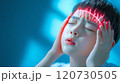 Young individual coping with intense headache in serene blue lighting during afternoon hours 120730505