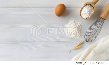 Baking background with flour, eggs, whisk and ears of wheat 120734638