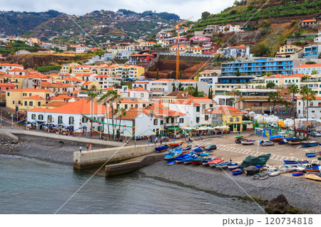 Scenic aerial view of famous fishing village of Camara de Lobos in Madeira island, Portugal 120734818