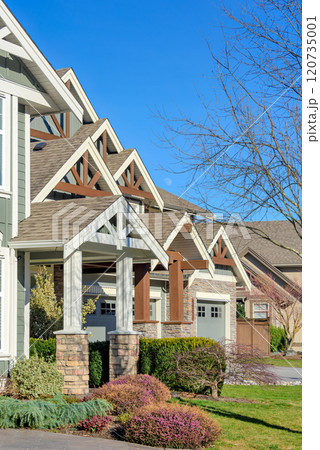 Front side of residential house on blue sky background 120735001