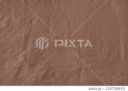 Textured brown plaster wall surface with brushstroke, painted, aged concrete background Textured brown plaster wall surface with brushstroke, painted, aged concrete background 120736610