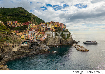 Colorful coastal village of Cinque Terre overlooking the sparkling Mediterranean Sea 120737929
