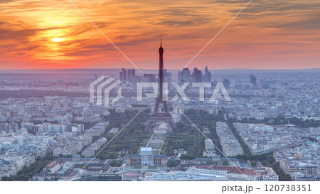 Panorama of Paris at sunset timelapse. Eiffel tower view from montparnasse building in Paris - France Panorama of Paris at sunset timelapse. Eiffel tower view from montparnasse building in Paris - France 120738351
