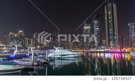 Dubai marina bay with yachts an boats night timelapse hyperlapse Dubai marina bay with yachts an boats night timelapse hyperlapse 120738427