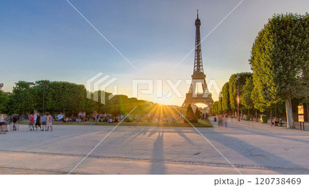 Eiffel Tower seen from Champ de Mars at sunset timelapse, Paris, France 120738469
