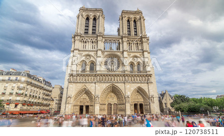 Front view of Notre-Dame de Paris timelapse hyperlapse, a medieval Catholic cathedral on the Cite Island in Paris, France 120738511