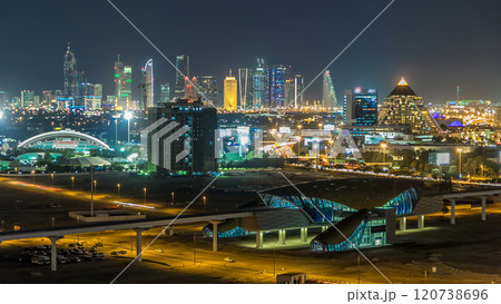 Dubai downtown skyline timelapse at night. Rooftop view of Sheikh Zayed road with numerous illuminated towers. Dubai downtown skyline timelapse at night. Rooftop view of Sheikh Zayed road with numerous illuminated towers. 120738696