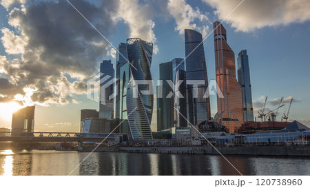 Sunset at Moscow City business center skyscrapers office buildings and luxury apartments timelapse hyperlapse. 120738960
