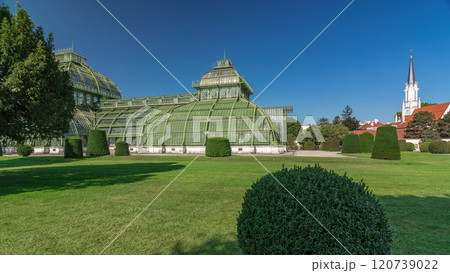 The Palmenhaus Schoenbrunn timelapse hyperlapse - a large greenhouse in the park Schoenbrunn in Vienna, Austria The Palmenhaus Schoenbrunn timelapse hyperlapse - a large greenhouse in the park Schoenbrunn in Vienna, Austria 120739022