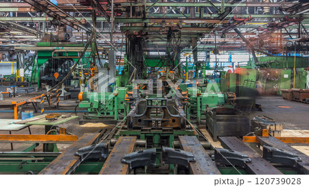 Conveyor assembly stage the body of tractor at big industrial factory timelapse 120739028