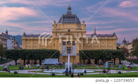 Day to night timelapse view of Art pavilion at King Tomislav square in Zagreb, Croatia. 120739057