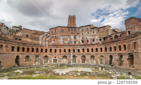 A panoramic view on Trajan's Market timelapse hyperlapse on the Via dei Fori Imperiali, in Rome, Italy 120739108
