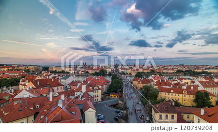 Scenic summer aerial view of the Old Town pier architecture and Charles Bridge over Vltava river timelapse in Praha. Prague, Czech Republic. 120739208