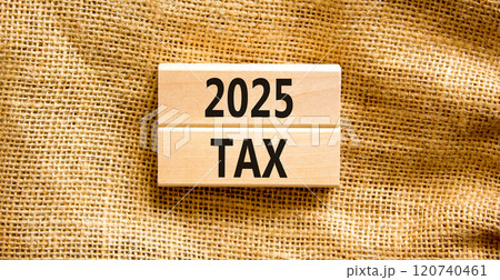 Planning 2025 tax new year symbol. Concept words 2025 Tax on beautiful wooden blocks. Beautiful canvas background. Business 2025 tax new year concept. Copy space. 120740461