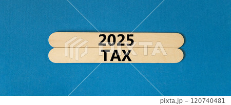 Planning 2025 tax new year symbol. Concept words 2025 Tax on beautiful wooden sticks. Beautiful blue background. Business 2025 tax new year concept. Copy space. 120740481