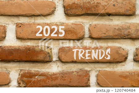 Planning 2025 trends new year symbol. Concept words 2025 Trends on beautiful brown brick wall. Beautiful brown brick wall background. Business 2025 trends new year concept. Copy space. 120740484