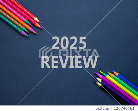 Planning 2025 review new year symbol. Concept words 2025 Review on beautiful black paper. Beautiful black paper background. Beautiful colored pencils Business 2025 review new year concept. Copy space. 120740561