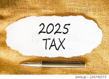 Planning 2025 tax new year symbol. Concept words 2025 Tax on beautiful white paper. Beautiful canvas background. Beautiful metallic pen. Business 2025 tax new year concept. Copy space. Planning 2025 tax new year symbol. Concept words 2025 Tax on beautiful white paper. Beautiful canvas background. Beautiful metallic pen. Business 2025 tax new year concept. Copy space. 120740573
