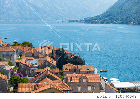 Stunning view of Kotor Bay with terracotta roofs of Perast and clear blue water 120740648