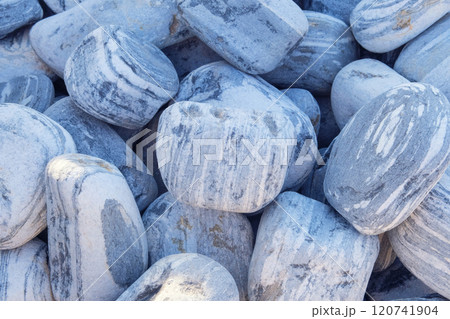 Decorative stones are sold in construction market. Sea pebbles. Natural stone material for decoration and construction. 120741904