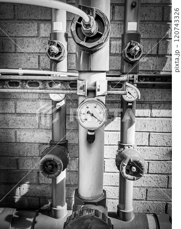 soil vapor extraction test well header with pressure gauge and sample line. 120743326