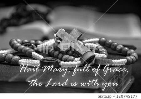 Hail Mary full of grace, the Lord is with you text or quote from the Holy Bible. Christianity concept Hail Mary full of grace, the Lord is with you text or quote from the Holy Bible. Christianity concept 120745177