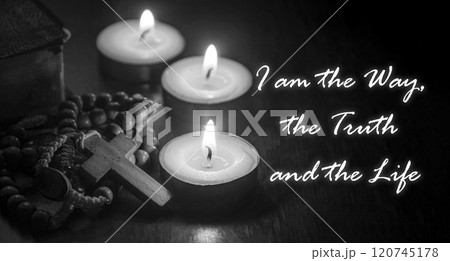 I am the Way and the Light text quoted from Holy Bible with Holy Rosary, Bible and burning candles background. Religious concept I am the Way and the Light text quoted from Holy Bible with Holy Rosary, Bible and burning candles background. Religious concept 120745178