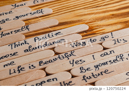 Positive thoughts for increasing selfesteem on wooden posts on wooden background Positive thoughts for increasing selfesteem on wooden posts on wooden background 120750224
