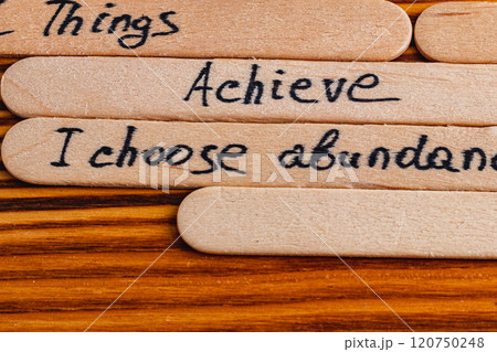 Positive thoughts for increasing selfesteem on wooden posts on wooden background Positive thoughts for increasing selfesteem on wooden posts on wooden background 120750248