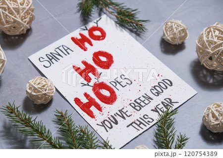 Unrecognizable woman preparing craft Christmas greeting card holiday present. Tactile hand-on activity. Creative me-made gifts. Seasonal domestic life micro moment hobby 120754389