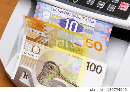 Dutch guilder in the counting machine 120754946