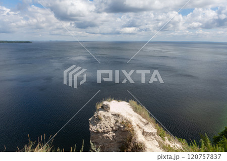 Majestic views of Vilga River from above with sprawling skies and tranquil waters capturing natures beauty 120757837