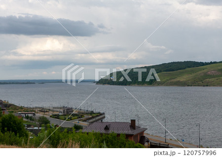 Misty waters of Sviyazhsk offer a serene escape into natures beauty alongside the tranquil riverbank 120757996