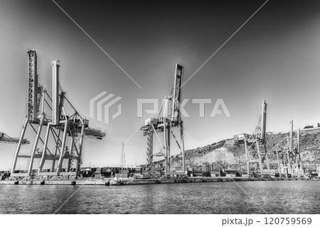 Container cranes at the commercial port of Barcelona, Catalonia, Spain Container cranes at the commercial port of Barcelona, Catalonia, Spain 120759569