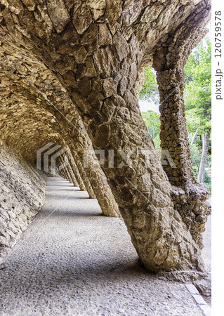 Colonnaded pathway in Park Guell, Barcelona, Catalonia, Spain 120759578