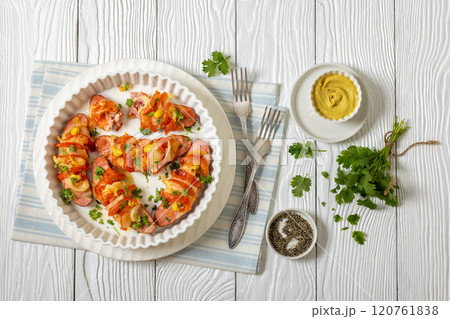 hot sausages baked with cheese, tomato, mustard hot sausages baked with cheese, tomato, mustard 120761838