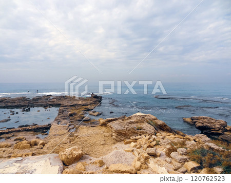 Rocky coast near the ancient Caesarea national park on the Mediterranean coastline, Israel. 120762523