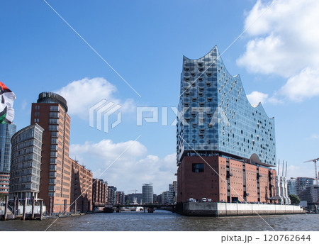 Elbphilarmonie - Elbe Philharmonic, a concert hall in the Hafen City quarter of Hamburg and river Elbe. The Westin Hamburg hotel. Hamburg, Germany Elbphilarmonie - Elbe Philharmonic, a concert hall in the Hafen City quarter of Hamburg and river Elbe. The Westin Hamburg hotel. Hamburg, Germany 120762644