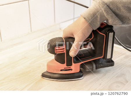 Work with a grinder on wood. Work tool. Work with a grinder on wood. Work tool. 120762790