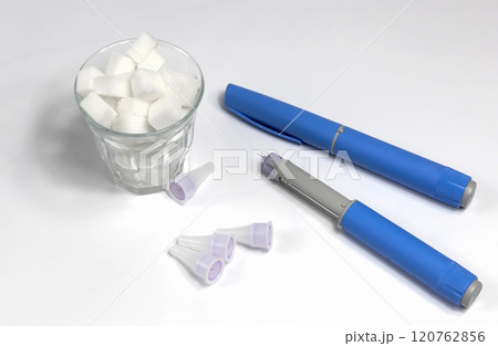 Hands in surgical gloves holding Ozempic Insulin injection pen for diabetics. 120762856