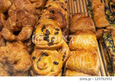 Various assortment of desserts confectionery on the counter in a bakery Various assortment of desserts confectionery on the counter in a bakery 120762952