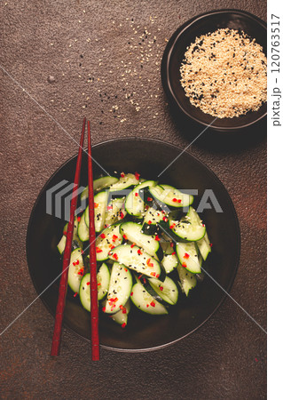 Chinese salad, cucumbers with chili pepper and sesame seeds, homemade, no people, 120763517